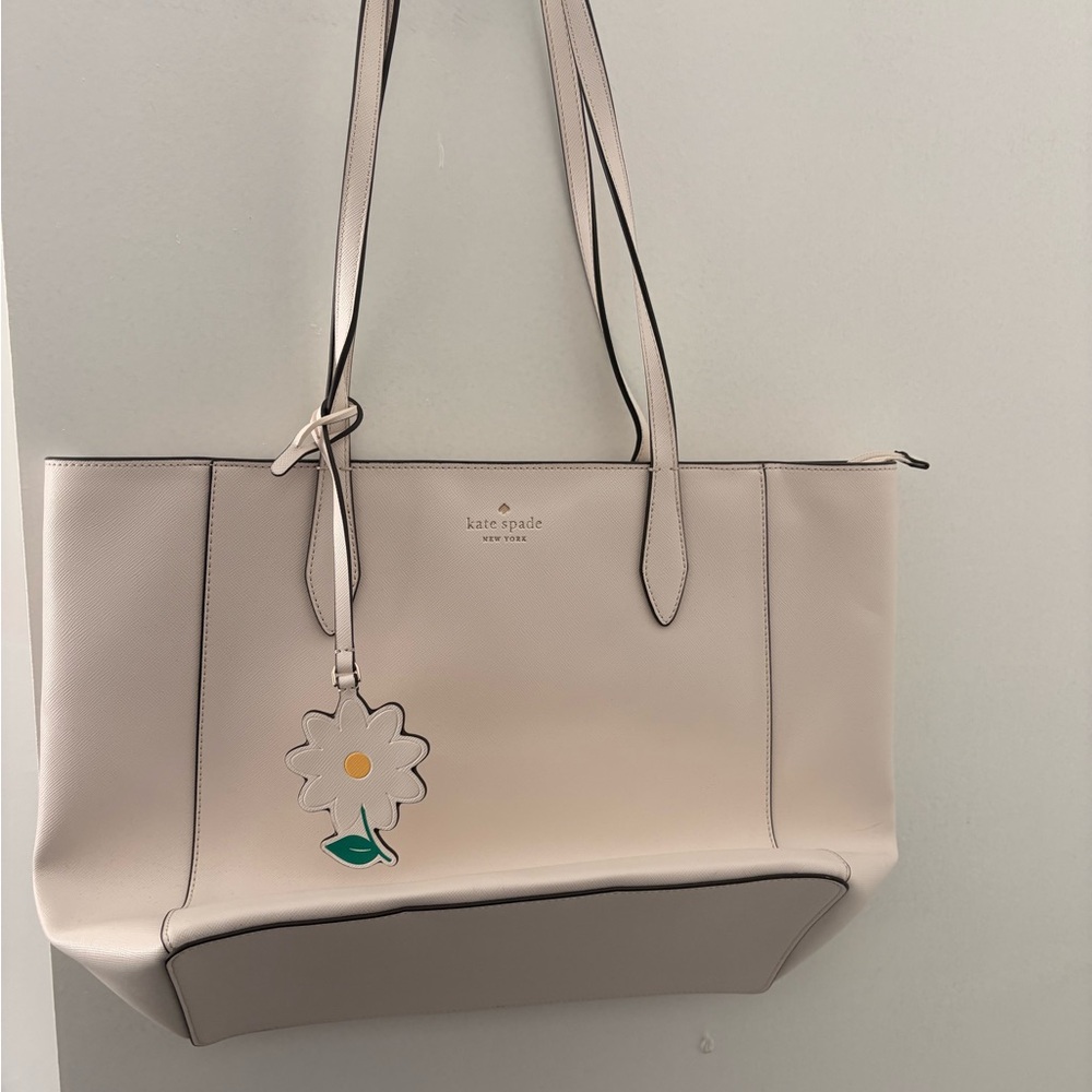 kate spade pale pink leather tote with daisy charm